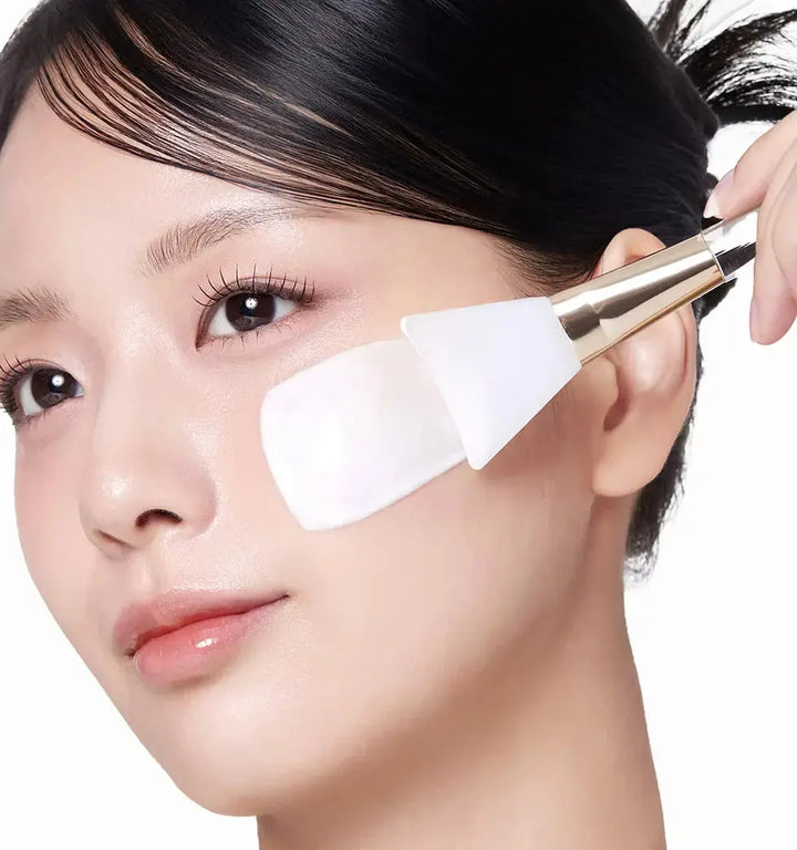 applying medicube collagen milk mask